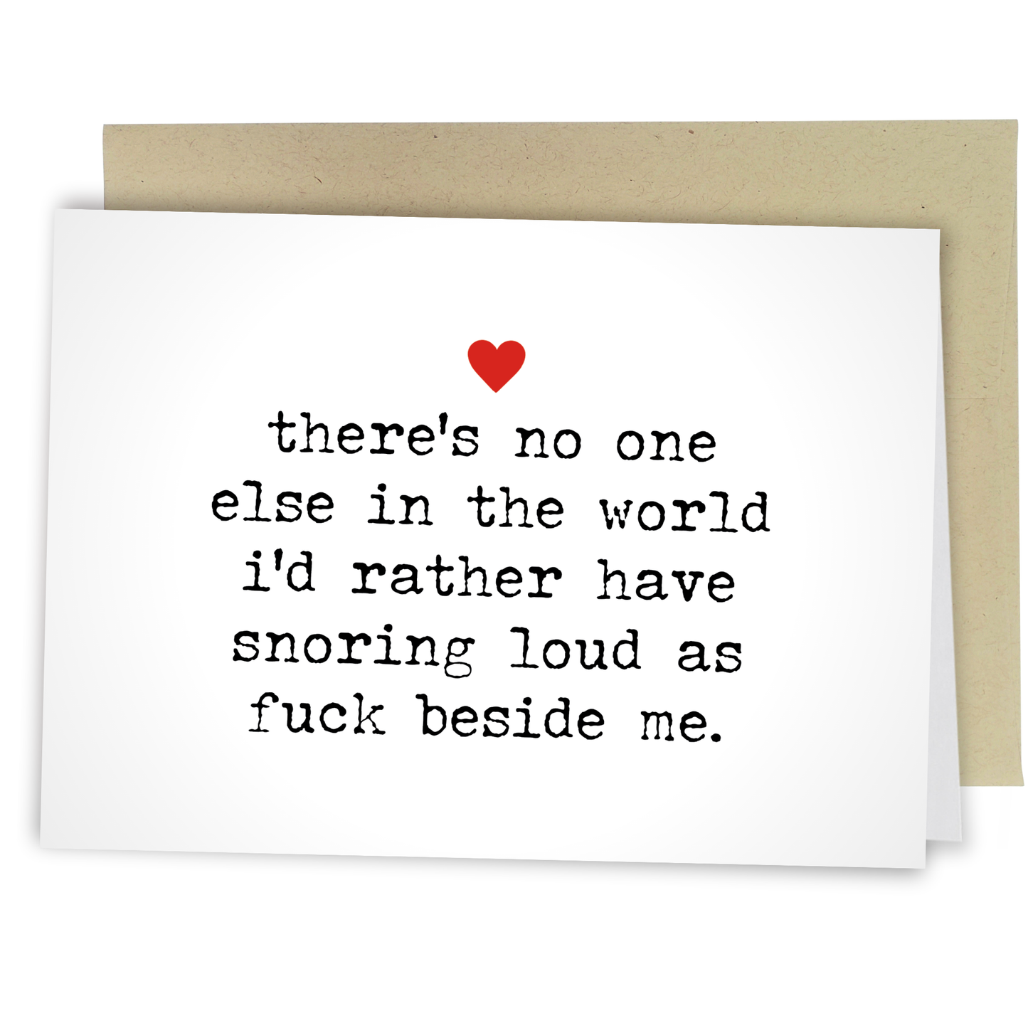 Alt text: A white greeting card with a small red heart at the top and black typewriter-style text in the center that reads, "there's no one else in the world i'd rather have snoring loud as fuck beside me." The card is displayed with a beige envelope partially visible behind it.