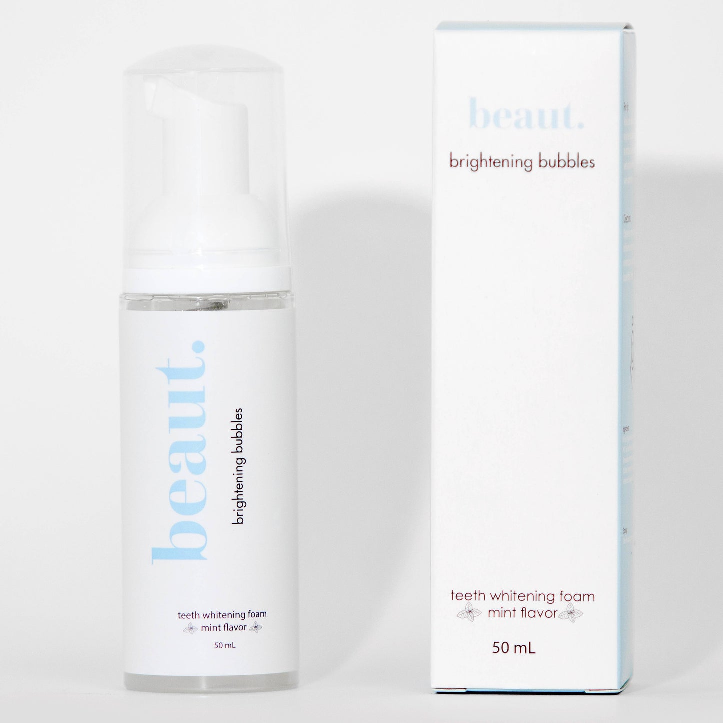 Beaut Brightening Bubbles teeth whitening foam in 50 mL bottles. Features a sleek design in pastel pink (strawberry flavor) and light blue (mint flavor), with matching minimalistic packaging. Promotes a fresh and radiant smile with a playful, modern aesthetic.