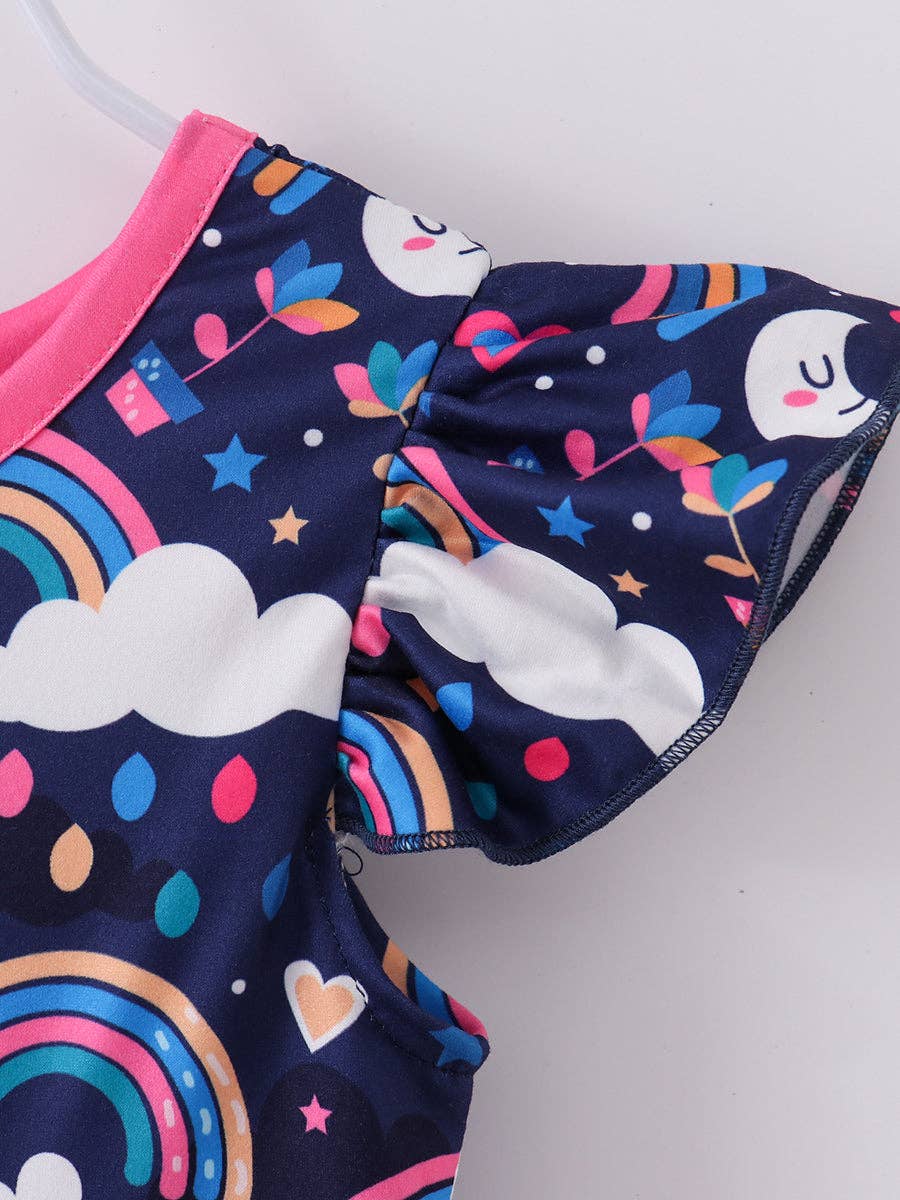 A colorful, sleeveless girls' dress featuring a playful, navy blue background adorned with vibrant prints of rainbows, clouds, stars, hearts, potted plants, and crescent moons with smiling faces. The dress has flutter sleeves, a bright pink collar, and a matching pink drawstring detail at the waist for a cinched fit. The whimsical pattern and cheerful colors make it ideal for casual wear or fun occasions.