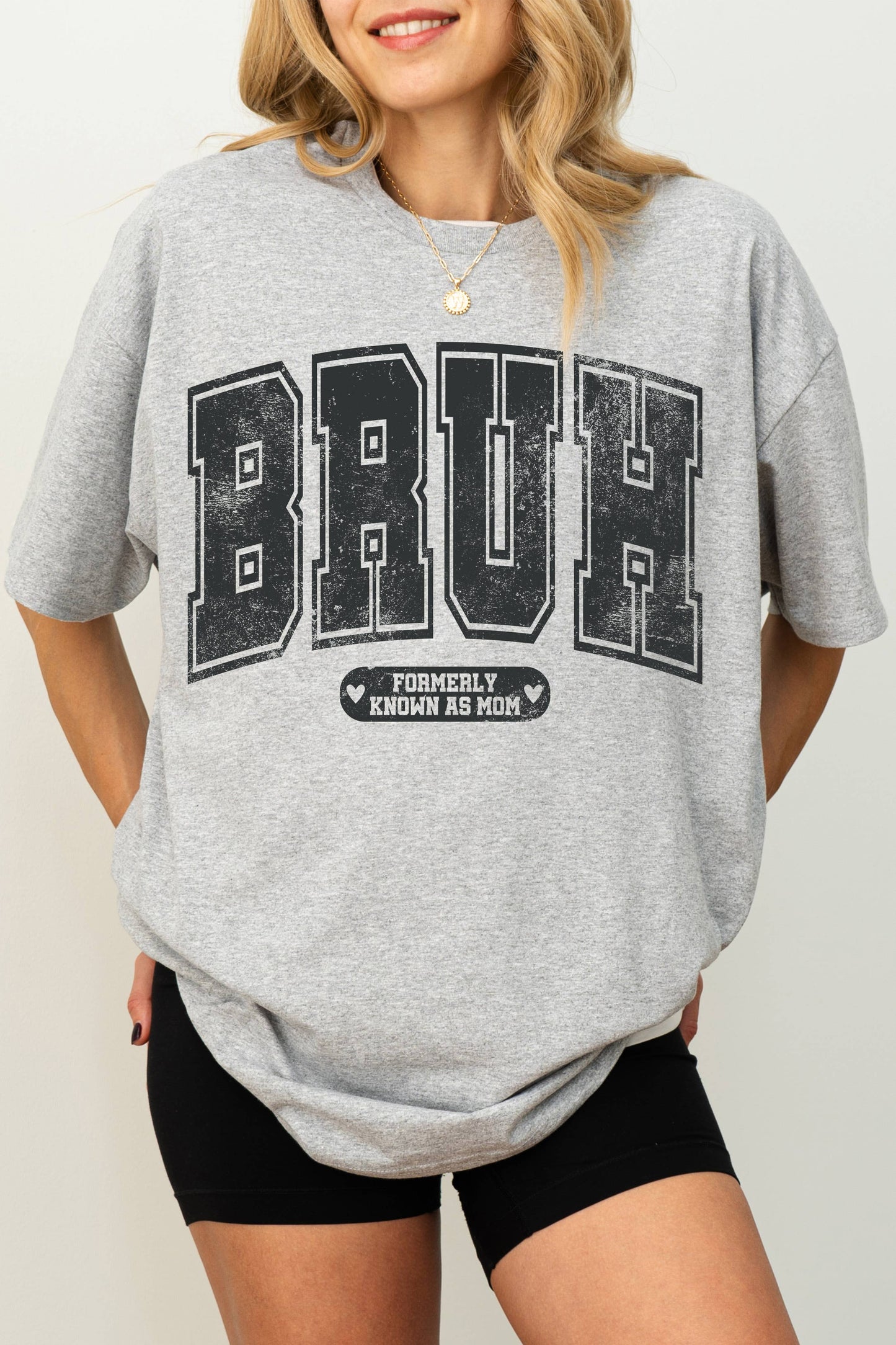 Graphic tee with 'Bruh, Formerly Known as Mom' text, funny motherhood shirt, playful mom-life slogan, casual unisex tee for moms, humorous parenting apparel, trendy statement shirt for moms with teens