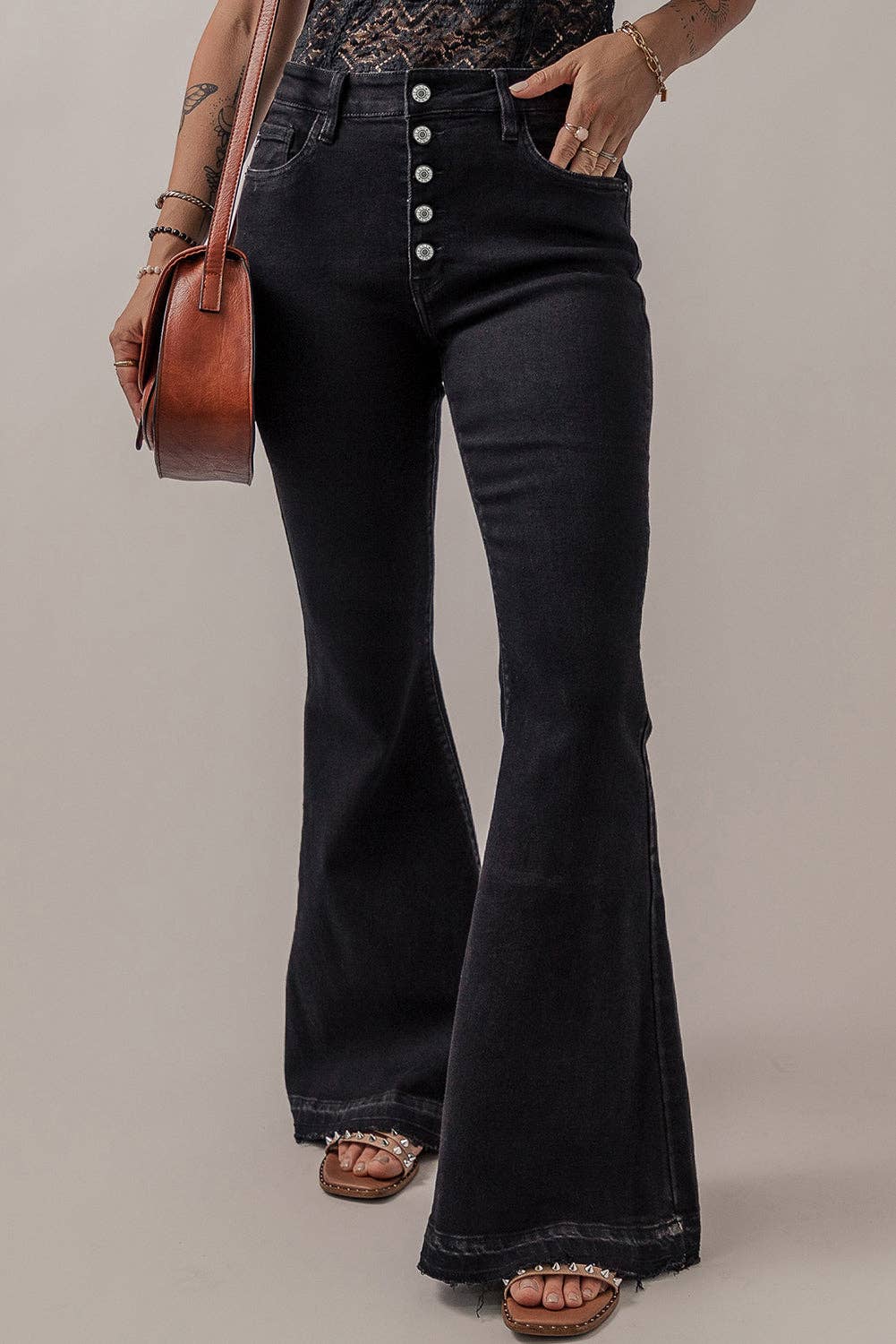 High waist button front flare jeans for women, offering a retro-inspired style with a flattering, fitted waist and flare leg design. Perfect for casual outfits, date nights, or vintage fashion looks. These stylish high-rise flare jeans feature button detailing for added flair and comfort. Available in various sizes for women, ideal for pairing with tops, blouses, or sweaters. Trendy and versatile flare jeans for a chic, fashion-forward wardrobe