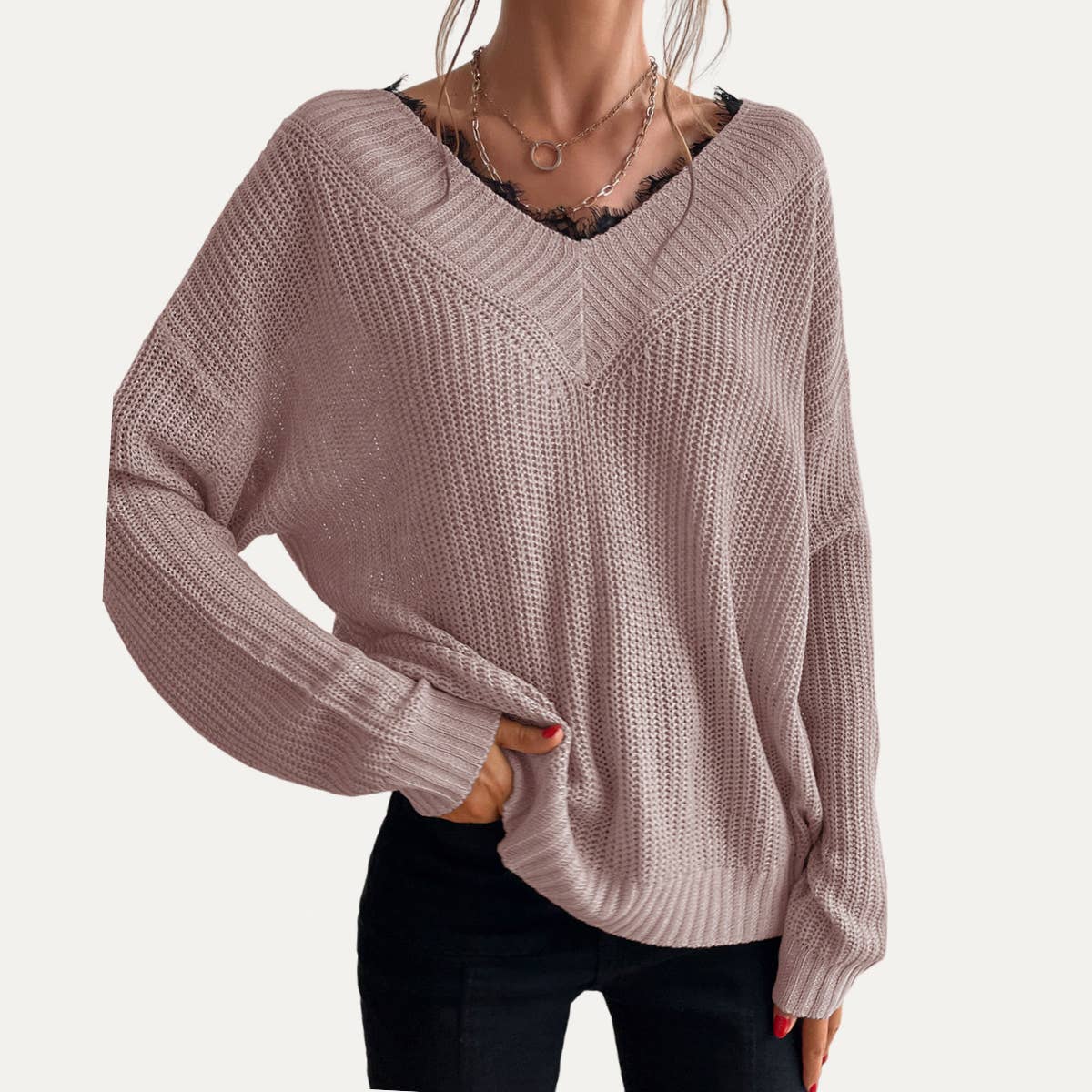 Cozy lace V-neck knit sweater for women, featuring elegant lace detailing along the neckline for a feminine touch. Perfect for fall and winter outfits, this soft knit sweater combines warmth with stylish design, making it ideal for casual wear or dressing up. With a relaxed fit and flattering V-neckline, this lace-trimmed sweater pairs effortlessly with jeans, skirts, or leggings. Available in various sizes and colors, this sweater is a must-have for women seeking comfort and style