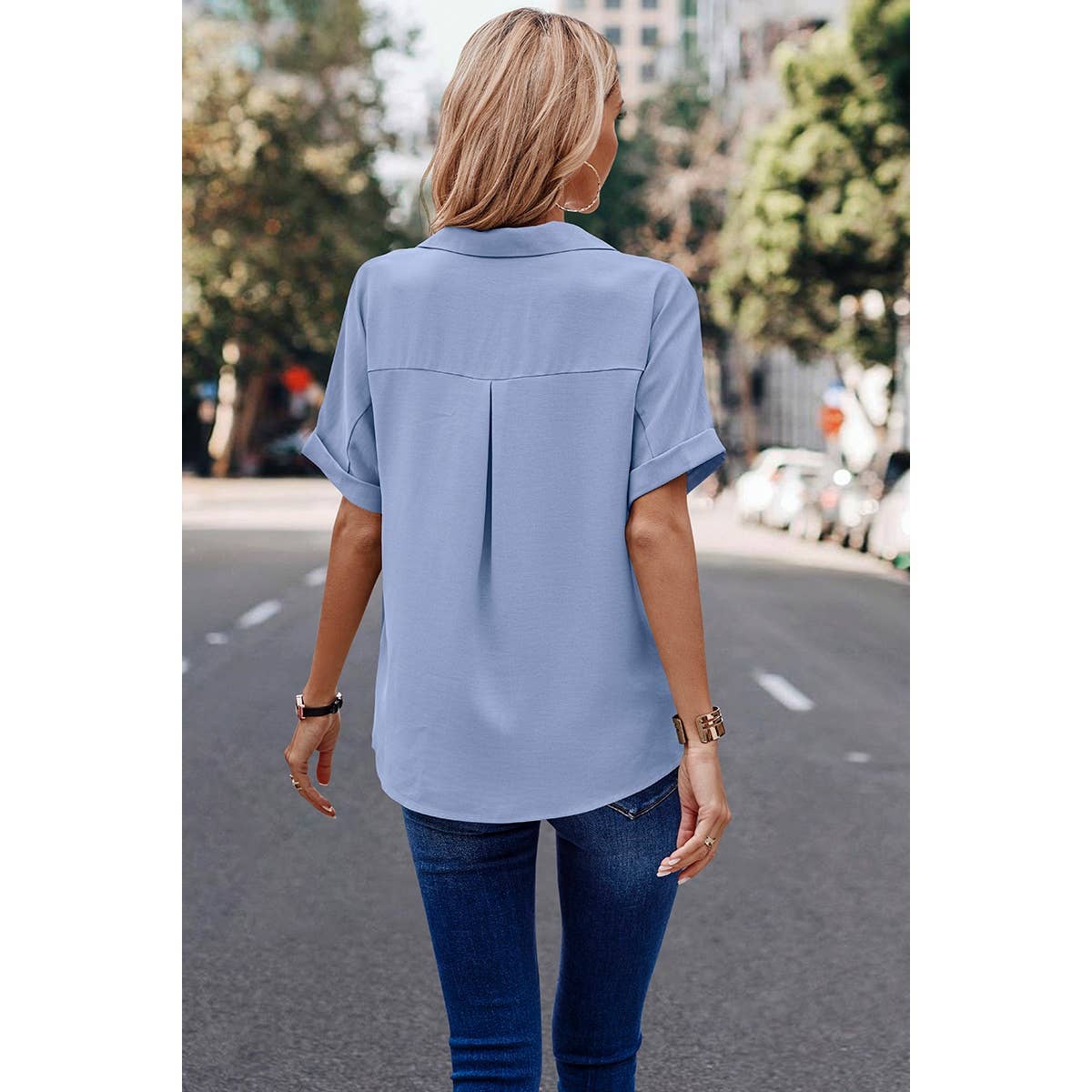 Women's blue button-up blouse with pockets, solid color fashion top, classic blue shirt, chic and versatile long sleeve blouse, stylish casual or office wear, elegant women’s button-up shirt
