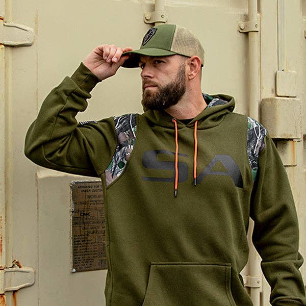 Stylish military green camo hoodie for men and women, featuring a bold camouflage print and a comfortable, relaxed fit. Perfect for casual outings, outdoor activities, or layering in cooler weather, this hoodie offers both warmth and an edgy, trendy look. Made from soft, breathable fabric, it includes a hood with adjustable drawstrings for added comfort. Available in various sizes, this versatile camo hoodie is a must-have for those looking to add a touch of military-inspired style to their wardrobe