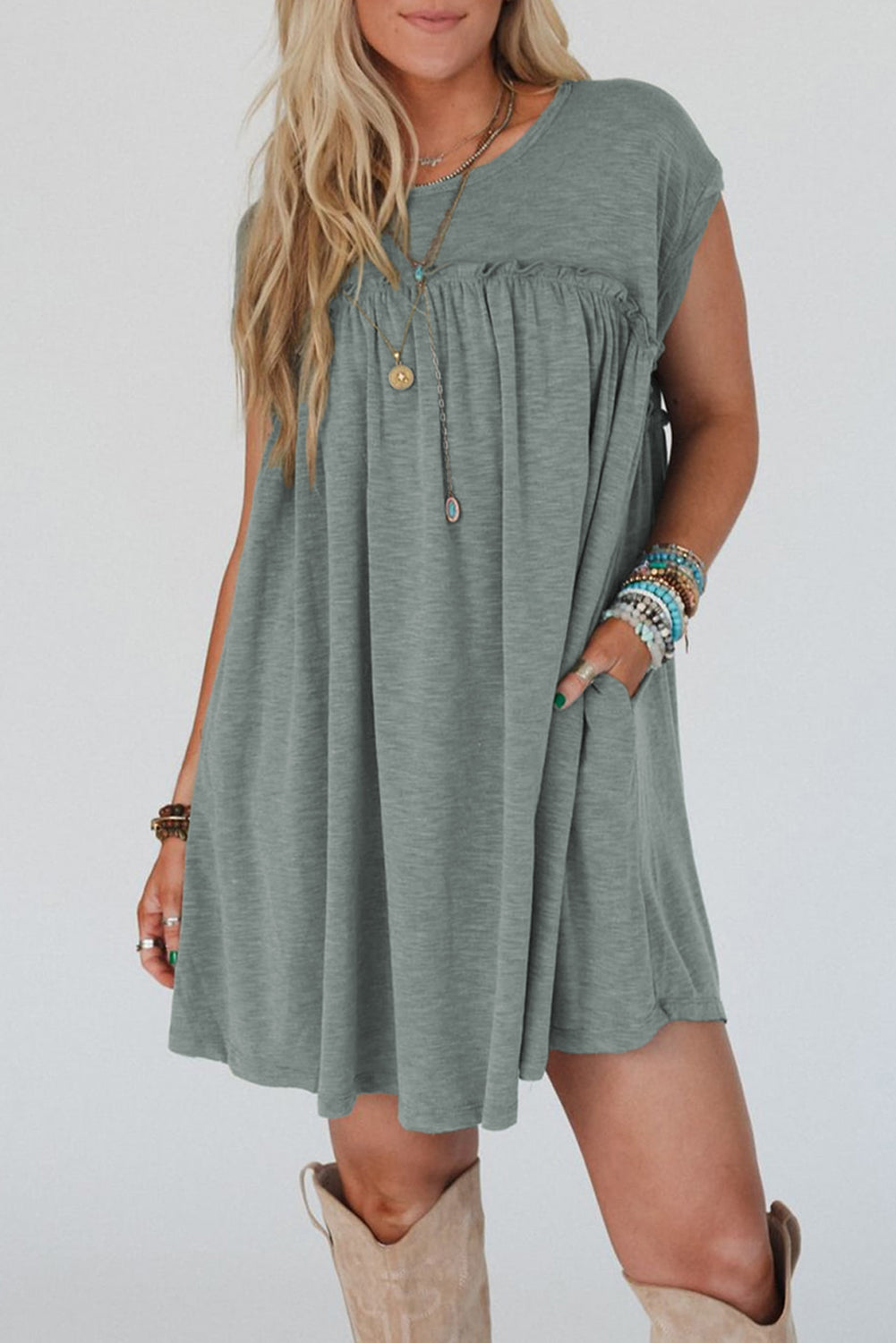 Frilled pleated t-shirt dress, casual t-shirt dress, pleated detail dress, feminine frilled dress, versatile day-to-night dress, comfortable and stylish dress, lightweight pleated t-shirt dress, relaxed fit dress, trendy pleated hem, effortless summer dress, relaxed yet flattering silhouette, must-have wardrobe piece, easy-to-wear casual dress, chic and comfortable outfit, perfect for any occasion, spring 2025, summer 2025 outfits
