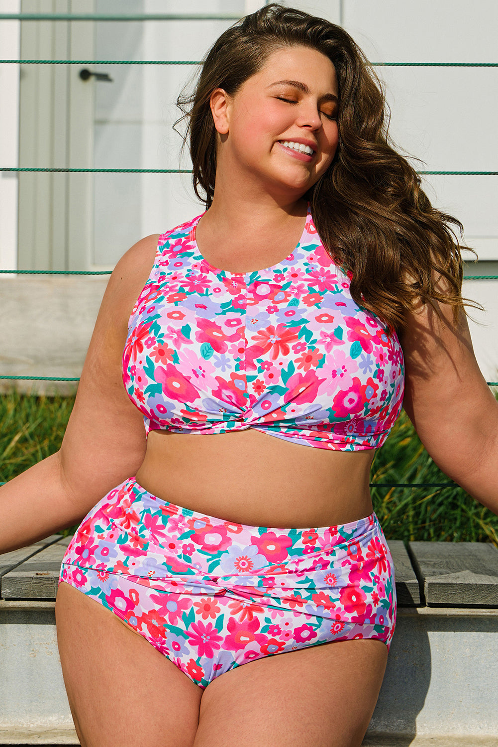 Floral print twisted high waist bathing suit plus size, flattering plus size swimwear, high waist swimsuit, floral pattern bathing suit, twist front design, comfortable and supportive swimwear, stylish plus size swimsuit, tummy control swimsuit, slimming high waist design, flattering swimwear for curvy women, chic and feminine beachwear, flattering and fashionable plus size swimsuit, plus size bathing suit, trendy swimwear, confident beach style