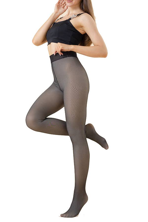 Image of footed fleece-lined tights designed to look translucent while providing full, cozy coverage. These tights have a unique "fake translucent" effect, giving the illusion of sheer fabric while concealing a warm, soft fleece lining underneath. The footed design and skin-toned appearance make them perfect for pairing with dresses, skirts, and shorts, achieving a stylish look without sacrificing warmth.