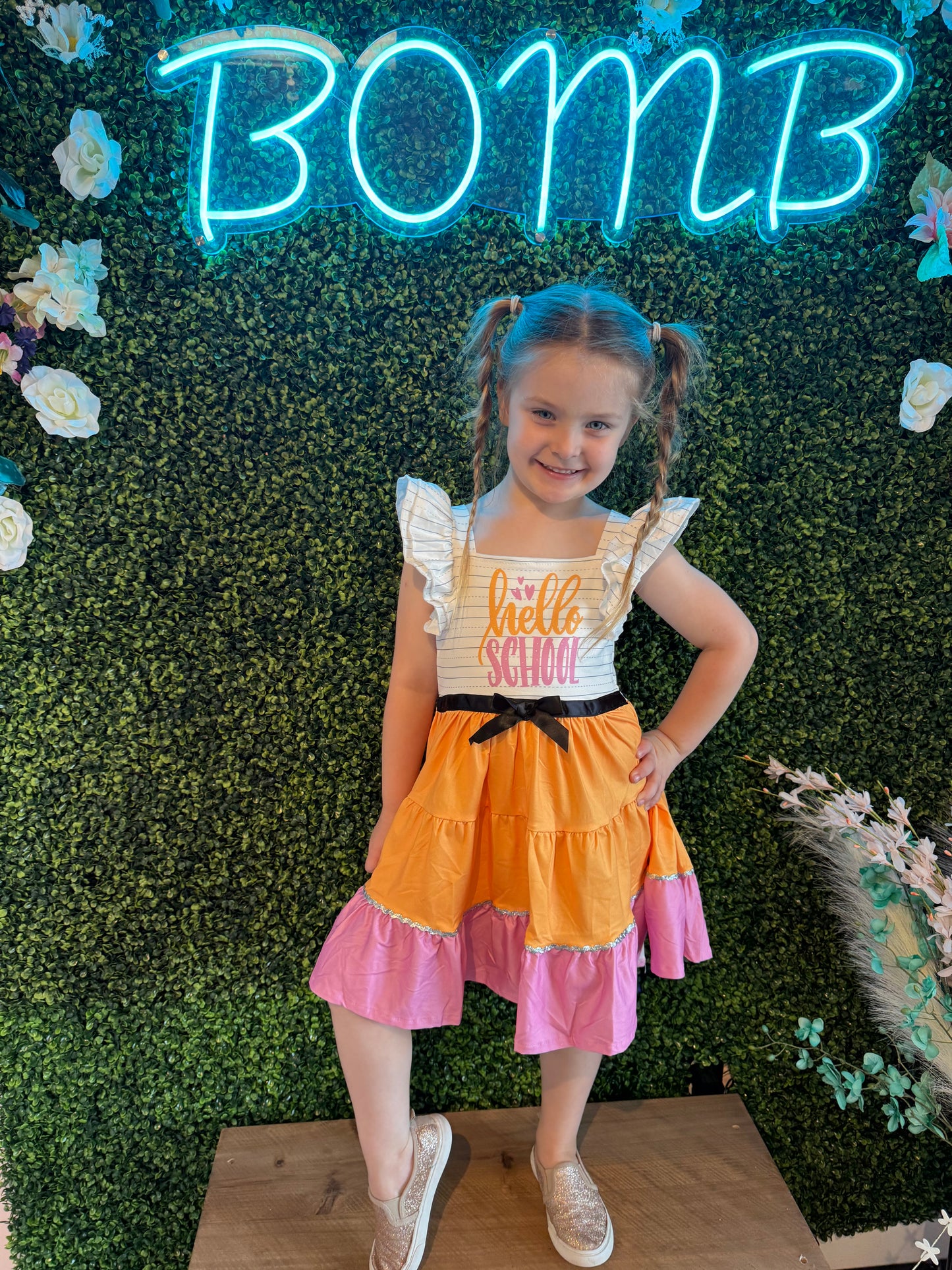 Adorable back-to-school dress for girls with 'Hello School' design, perfect for school days, casual wear, and fall fashion. Comfortable and stylish dress for kids, ideal for first day of school, classroom outfits, or school events. Available in multiple sizes for girls. Trendy school attire for young girls, featuring fun and unique design, ideal for back-to-school season.