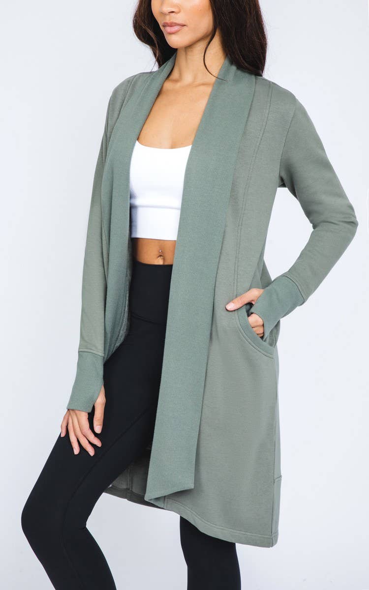 Cozy long sleeve fleece-lined cardigan for women, offering warmth and comfort with soft fleece lining and a relaxed fit. Perfect for fall and winter layering, this open-front cardigan is ideal for casual wear, outdoor activities, or staying warm indoors. Made with durable knit fabric, this fleece-lined cardigan pairs easily with jeans, leggings, or dresses for a stylish, versatile look. Available in various sizes and colors, this must-have cardigan provides both comfort and fashion
