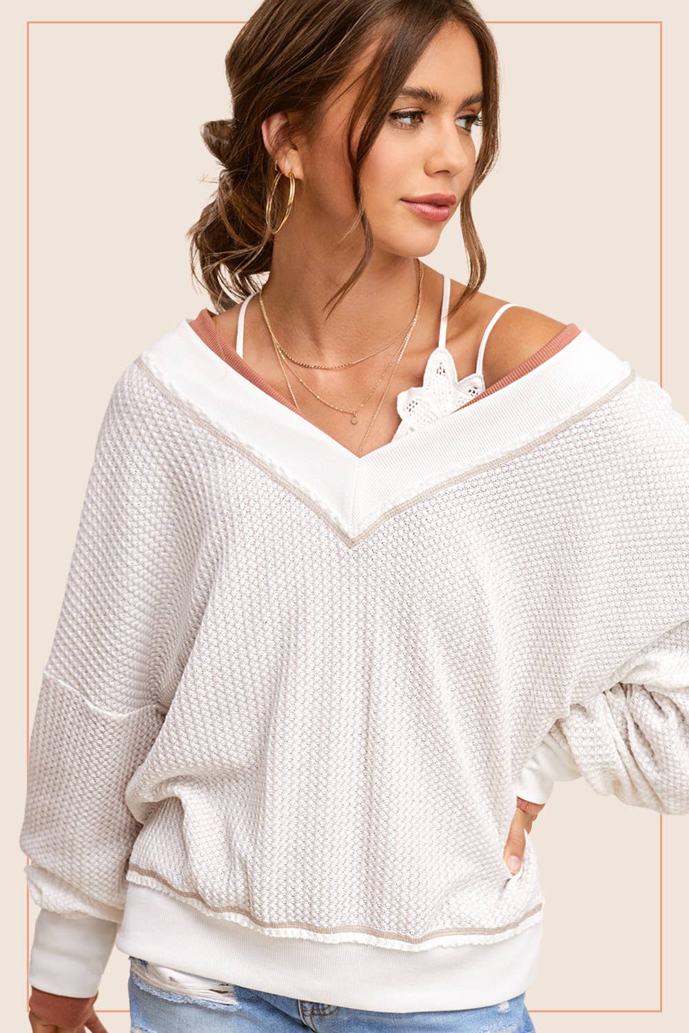 Comfortable loose fit long sleeve waffle textured top for women, featuring a relaxed silhouette and soft, breathable fabric. Ideal for casual wear, this stylish top offers a cozy and laid-back look, perfect for layering or wearing on its own. The unique waffle texture adds dimension and visual interest, making it a versatile piece for everyday outfits. Available in various sizes and colors, this loose fit long sleeve top is perfect for pairing with jeans, leggings, or skirts