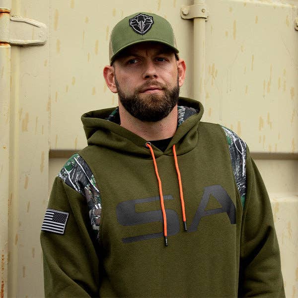 Stylish military green camo hoodie for men and women, featuring a bold camouflage print and a comfortable, relaxed fit. Perfect for casual outings, outdoor activities, or layering in cooler weather, this hoodie offers both warmth and an edgy, trendy look. Made from soft, breathable fabric, it includes a hood with adjustable drawstrings for added comfort. Available in various sizes, this versatile camo hoodie is a must-have for those looking to add a touch of military-inspired style to their wardrobe
