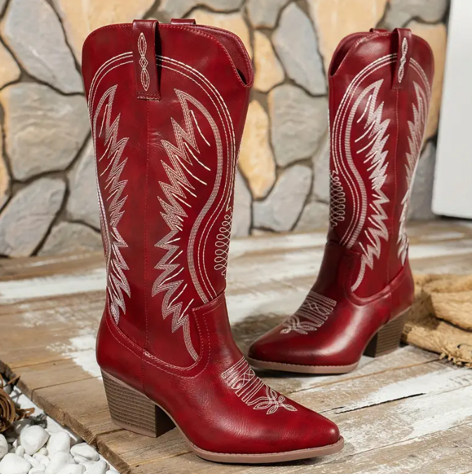 Women's embroidered western cowboy boots, red and black cowboy boots, statement cowgirl boots, classic western boots, rodeo-ready footwear, stylish country boots, vintage-inspired cowboy boots, detailed embroidery boots, trendy western fashion, country concert outfit, bold cowgirl style, durable leather boots, fashion-forward western boots, must-have cowboy boots, rustic yet chic footwear, modern cowgirl look, festival-ready boots, high-quality western wear, timeless western boots, standout country fashion