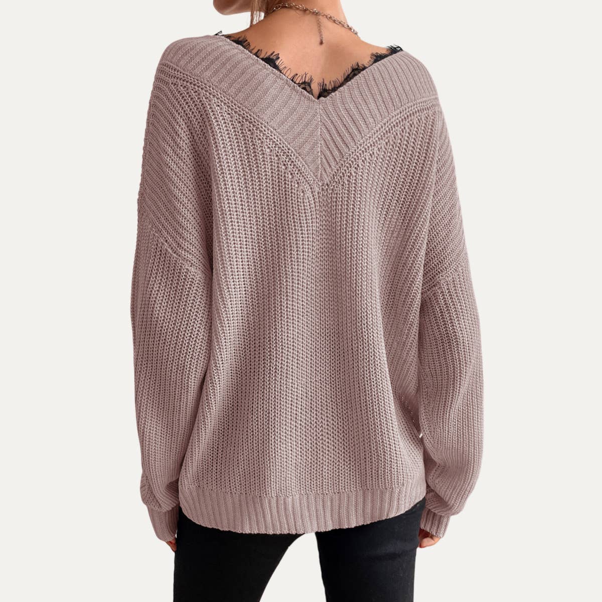 Cozy lace V-neck knit sweater for women, featuring elegant lace detailing along the neckline for a feminine touch. Perfect for fall and winter outfits, this soft knit sweater combines warmth with stylish design, making it ideal for casual wear or dressing up. With a relaxed fit and flattering V-neckline, this lace-trimmed sweater pairs effortlessly with jeans, skirts, or leggings. Available in various sizes and colors, this sweater is a must-have for women seeking comfort and style