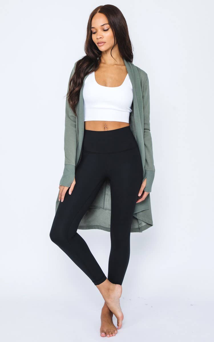 Cozy long sleeve fleece-lined cardigan for women, offering warmth and comfort with soft fleece lining and a relaxed fit. Perfect for fall and winter layering, this open-front cardigan is ideal for casual wear, outdoor activities, or staying warm indoors. Made with durable knit fabric, this fleece-lined cardigan pairs easily with jeans, leggings, or dresses for a stylish, versatile look. Available in various sizes and colors, this must-have cardigan provides both comfort and fashion