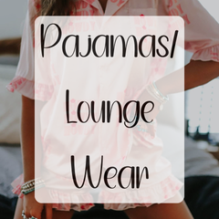 Text "Adult Pajamas" over an image of a woman wearing pink printed pajama shorts and a matching button-up top with ruffle details. Highlights stylish and comfortable sleepwear for adults. Keywords: adult pajamas, sleepwear, loungewear, cozy fashion.